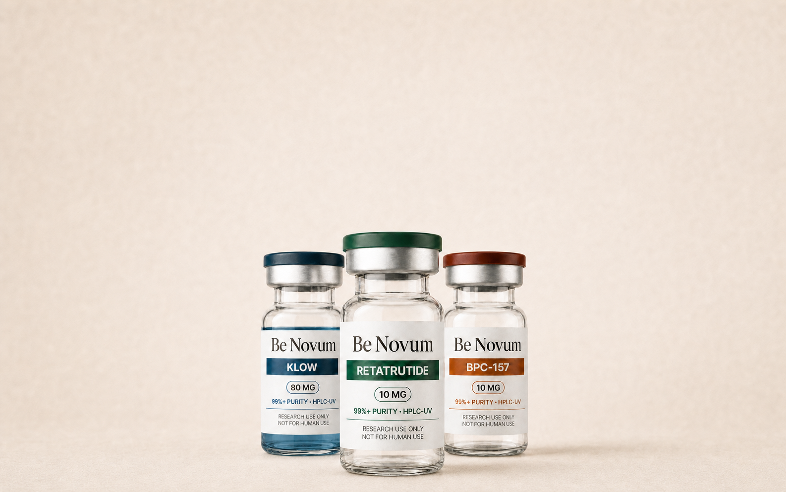 Three Be Novum research vials: KLOW, Retatrutide, and BPC-157, each labeled for research use only